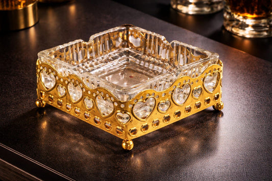 Gold heart-frame crystal ashtray with royal filigree and ball feet