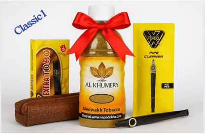 Al Khumery dokha tobacco bottle with a red bow, X torbo  dokah acessoriess on a white background. Vape dokah UAE 
