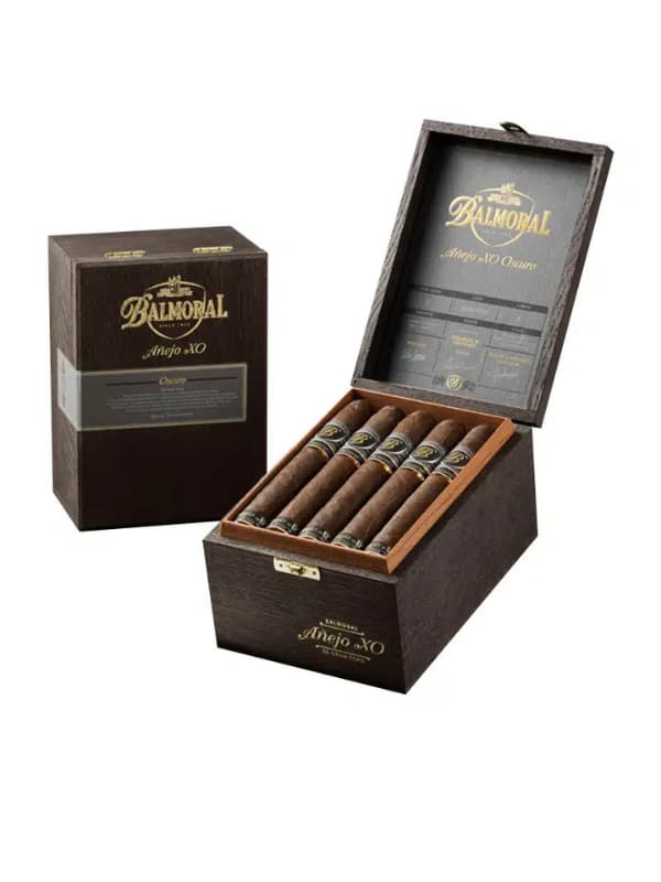 Balmoral cigars in an open wooden box on a white background .Vape Dokha UAE