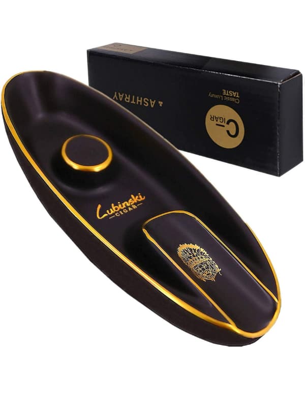 Black and gold cigar humidor with Lubincki branding on a white background.Vape Dokha UAE