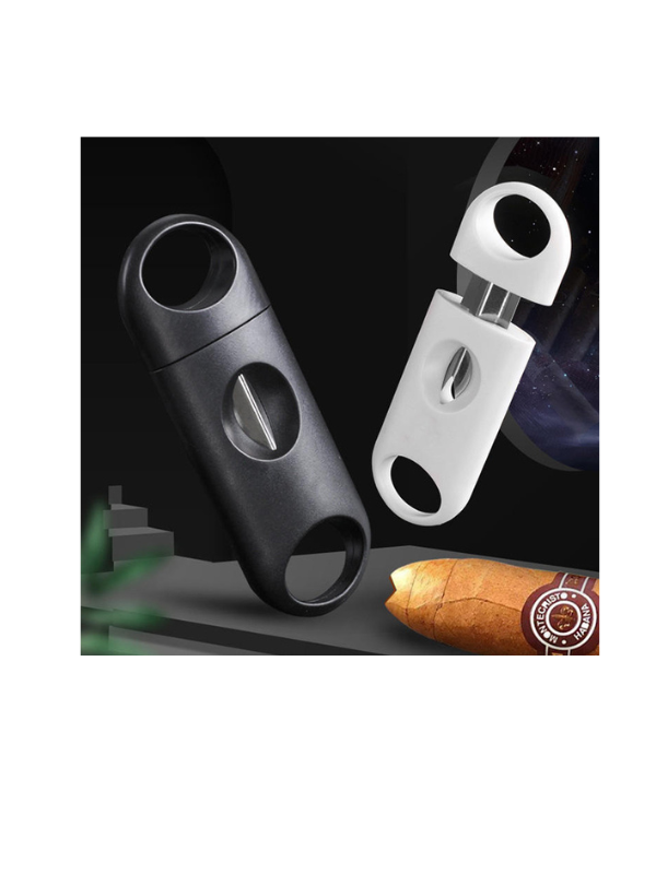 Black and white cigar cutters with a cigar on a dark background. Vape Dokha UAE