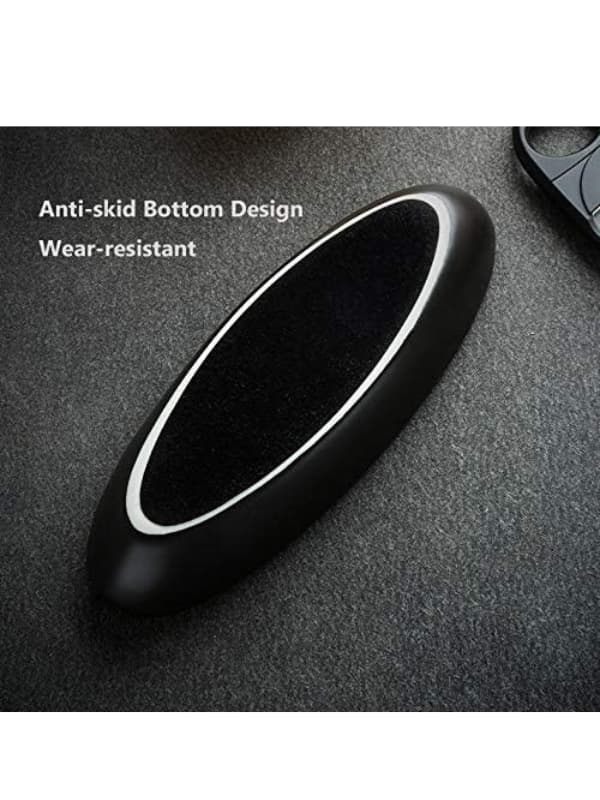 Black car steering wheel cover with anti-skid bottom design text on a dark background. Vape Dokah UAE