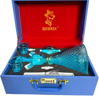 Blue glass decanter set with two glasses in a Richman branded box. Vape Dokha UAE