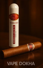 Cigar and Romeo y Julieta vape dokha bottle on a dark surface .Vape Dokha UAE