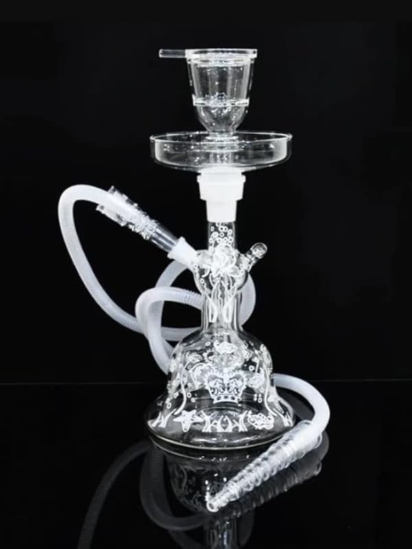 Clear glass hookah with white hose on a black background . Vape Dokha UAE