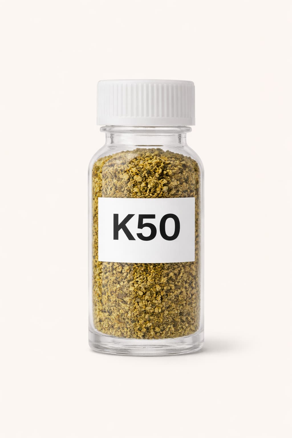 Clear glass jar with white lid and label displaying 'K50' dokha on a white background