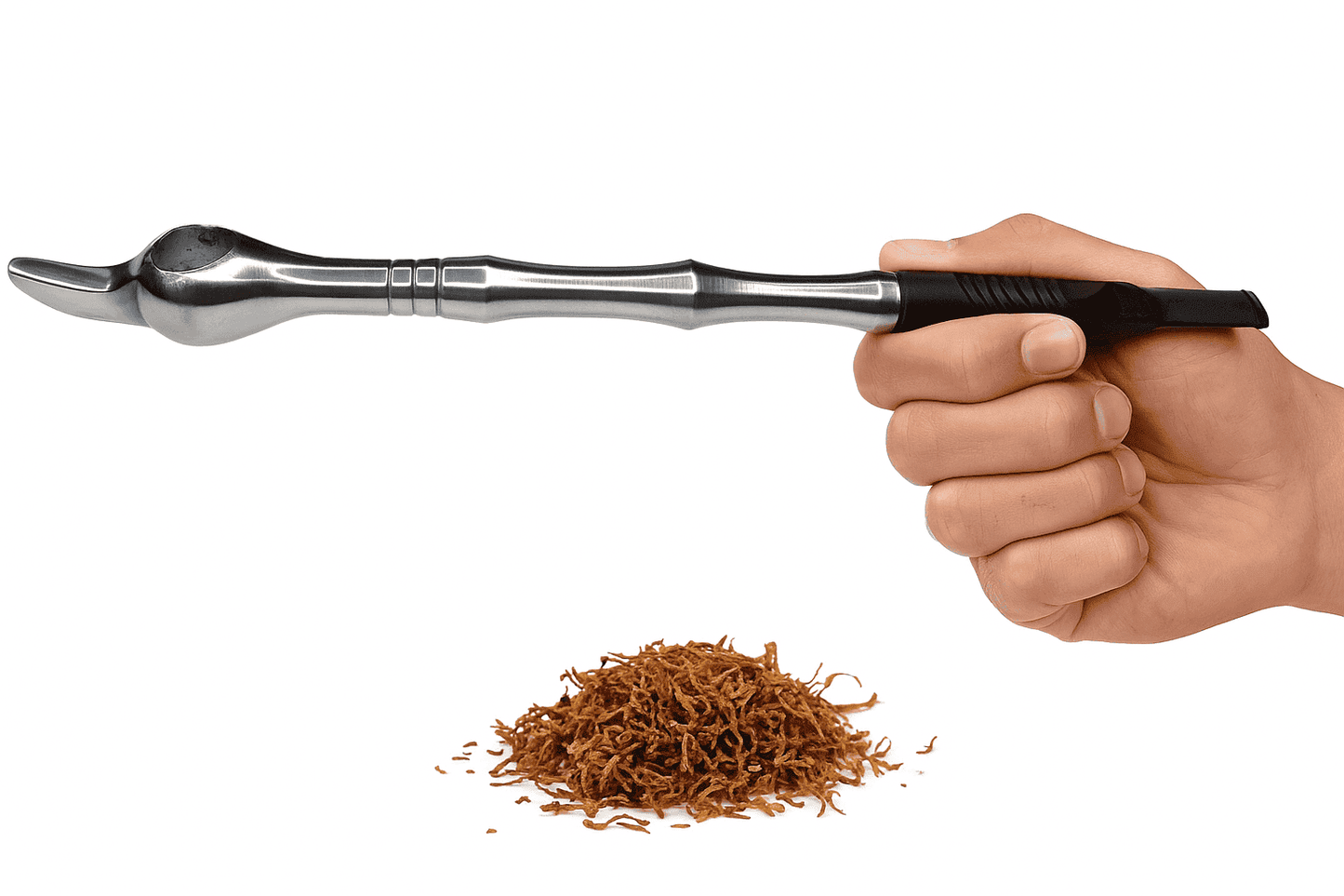 Hand holding a steel medwakh pipe over a pile of tobacco leaves on a white background. vape dokah UAE