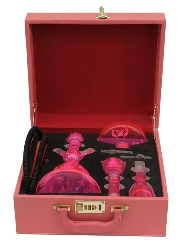 Pink dental tool set in a red box with gold accents . Vape Dokha UAE