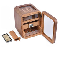 Wooden cigar humidor with accessories on a white background. Vape Dokha UAE