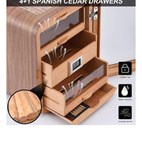 Wooden jewelry box with open drawers displaying jewelry, labeled '4+1 Spanish Cedar Drawers'. Vape Dokha UAE