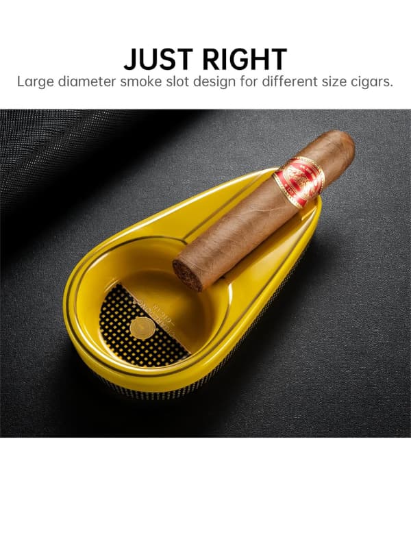 Yellow cigar ashtray with a cigar on a dark background.Vape Dokha UAE